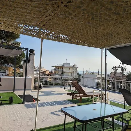 Sunny Terrace In Glyfada Афины